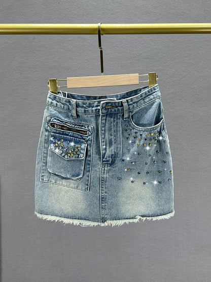 Diamond-encrusted denim short skirt for women, trendy 2023 new summer high-waisted slim-fitting European style raw edge hip-hugging skirt