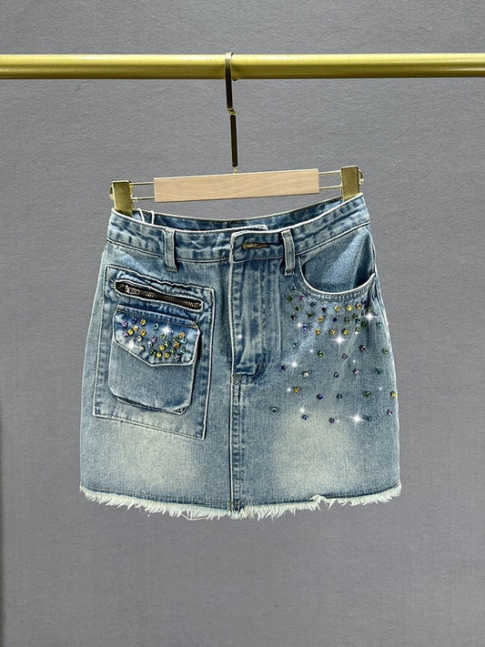 Diamond-encrusted denim short skirt for women, trendy 2023 new summer high-waisted slim-fitting European style raw edge hip-hugging skirt