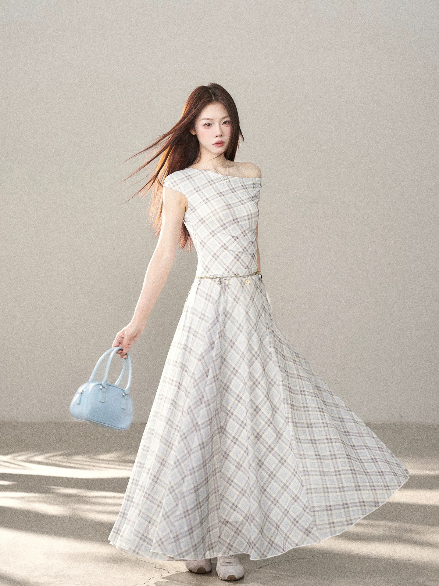 A beautiful long dress with a blue plaid pattern and a small wild berry design, perfect for summer 2026. A Korean style fashion statement.