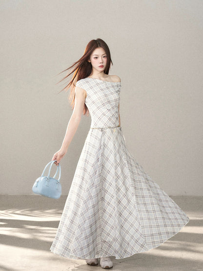 A beautiful long dress with a blue plaid pattern and a small wild berry design, perfect for summer 2026. A Korean style fashion statement.