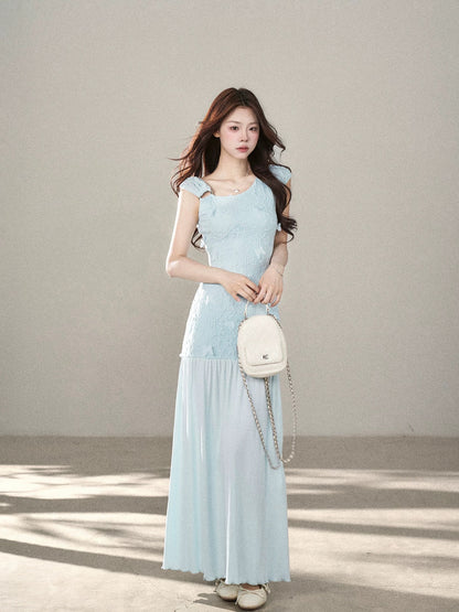 A beautiful blue knitted lace dress with a hint of wild berries, a new summer 2026 style for women, a super pretty fairy-like long dress.