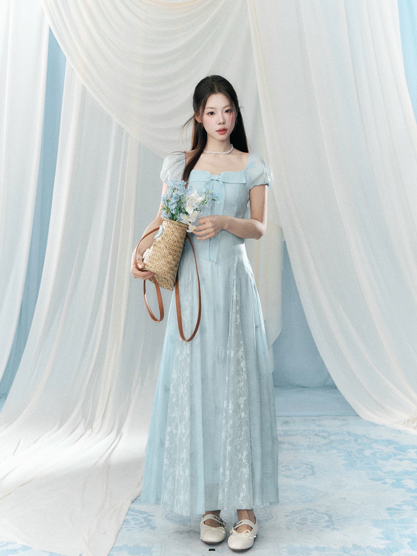 A small wild berry blue short-sleeved square neck dress for women, a new Korean style gentle long dress for summer 2026.