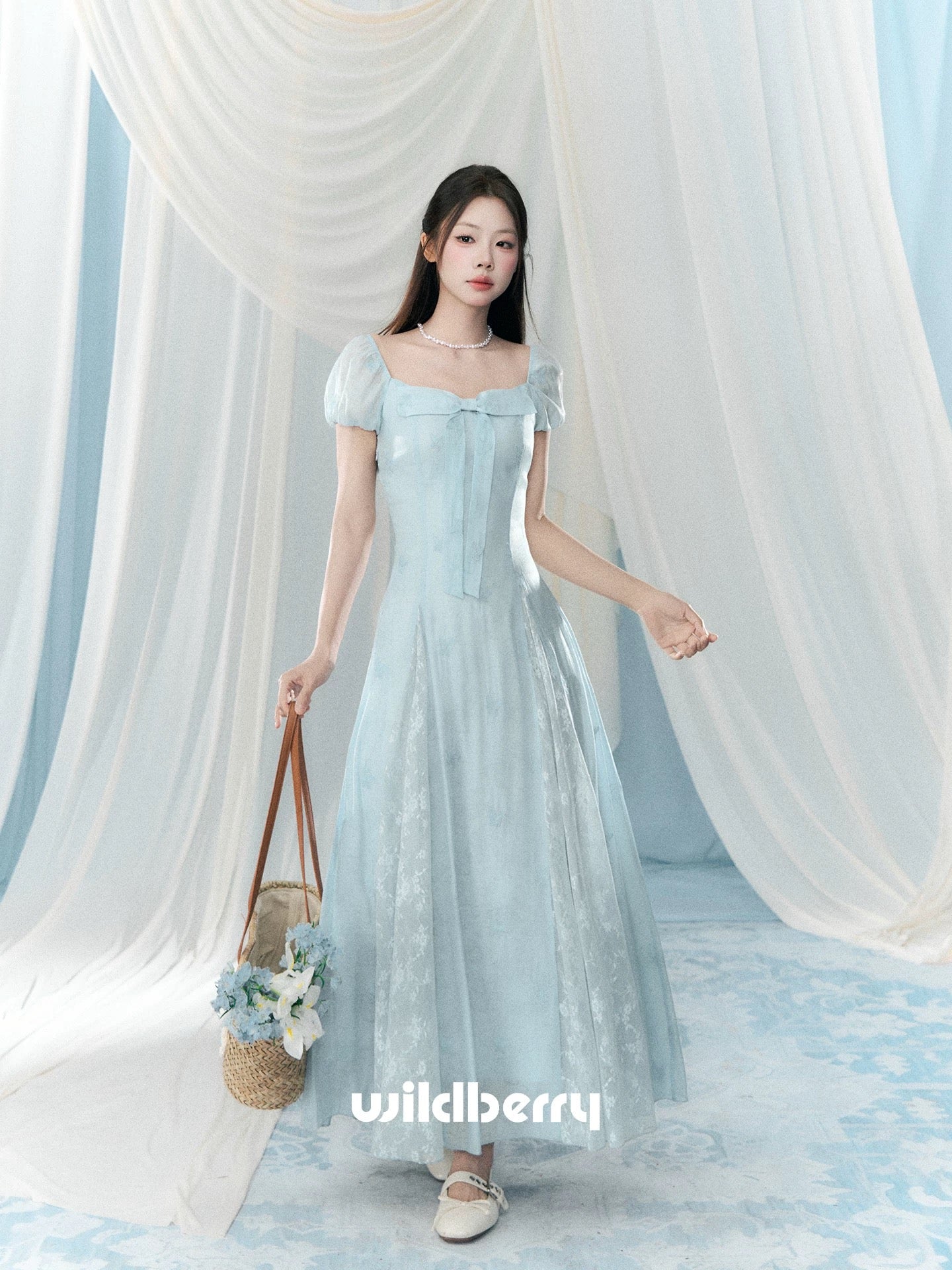 A small wild berry blue short-sleeved square neck dress for women, a new Korean style gentle long dress for summer 2026.