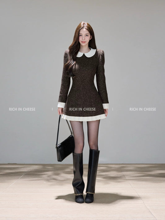 Shu Hulei, a sophisticated and elegant woman in a MIU-style dress, featuring a fitted waist and a Chanel-inspired A-line skirt, perfect for winter.