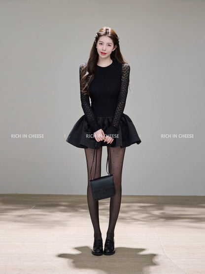 Shu Hulei, a ballet dancer, wears a sophisticated evening gown with lace trim and a high-waisted tulle skirt, exuding elegance and class.
