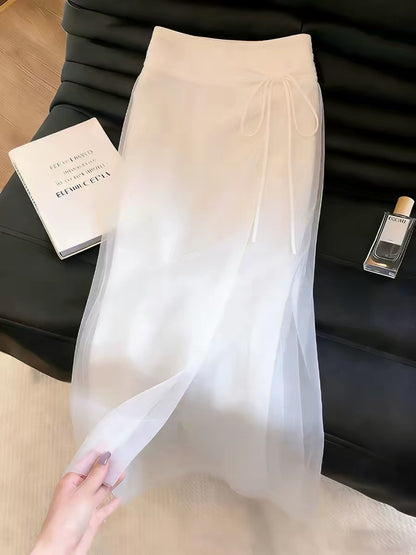 Women's white mesh skirt featuring a stylish slit design—a new arrival for Summer 2026 that exudes a gentle, dignified, and elegant charm.