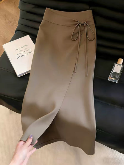 Women's brown skirt with a stylish slit design—a unique, chic, and sophisticated piece from the Summer 2026 collection that stands out from the crowd.