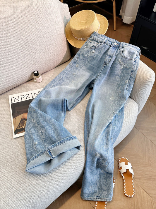 Blue high-waisted wide-leg jeans with rhinestone accents, a super stylish and versatile straight-leg style for women, perfect for summer 2026.