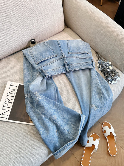 Blue high-waisted wide-leg jeans with rhinestone accents, a super stylish and versatile straight-leg style for women, perfect for summer 2026.