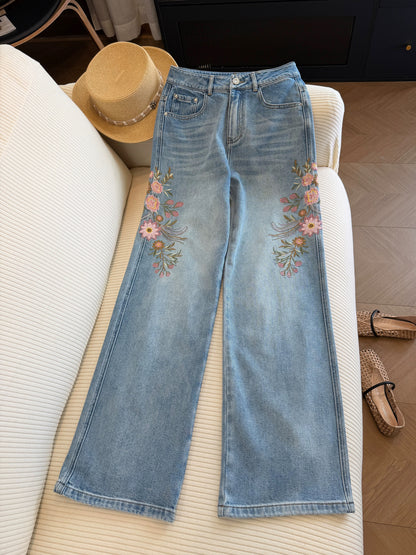 Light blue floral embroidered high-waisted straight-leg jeans for women, new summer 2026 style, flattering wide-leg pants.