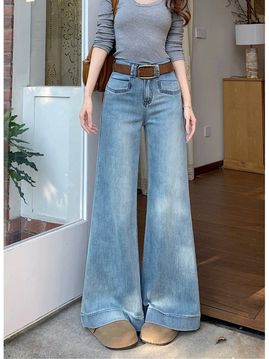 High-waisted, loose-fitting wide-leg jeans, versatile denim for women, spring retro blue floor-length straight leg trousers with a slight flare.
