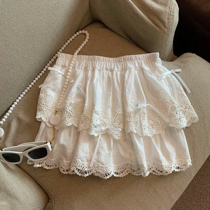 Guangzhou Shisanhang high-quality goods hot-selling ~ white lace bow embroidered short skirt for women to prevent exposure design