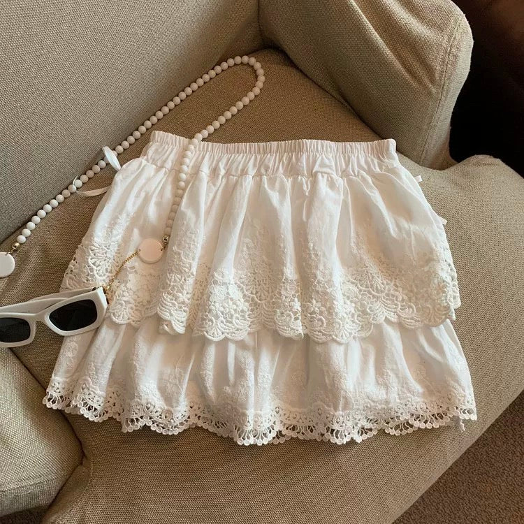 Guangzhou Shisanhang high-quality goods hot-selling ~ white lace bow embroidered short skirt for women to prevent exposure design