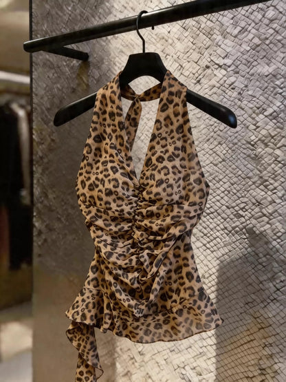 Sexy American-style chiffon halter top featuring a leopard print, ruffles, and asymmetrical flowing ribbons—perfect for wearing as a standalone piece.