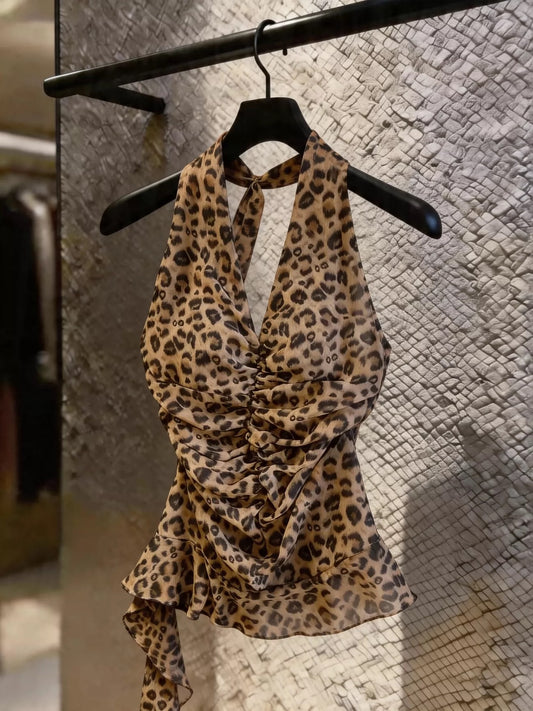 Sexy American-style chiffon halter top featuring a leopard print, ruffles, and asymmetrical flowing ribbons—perfect for wearing as a standalone piece.