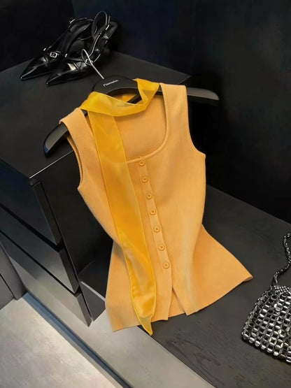 Chic French-style ice-silk knit camisole featuring a square neck and elegant ribbon halter straps—a stylish, sleeveless top perfect for summer wear.