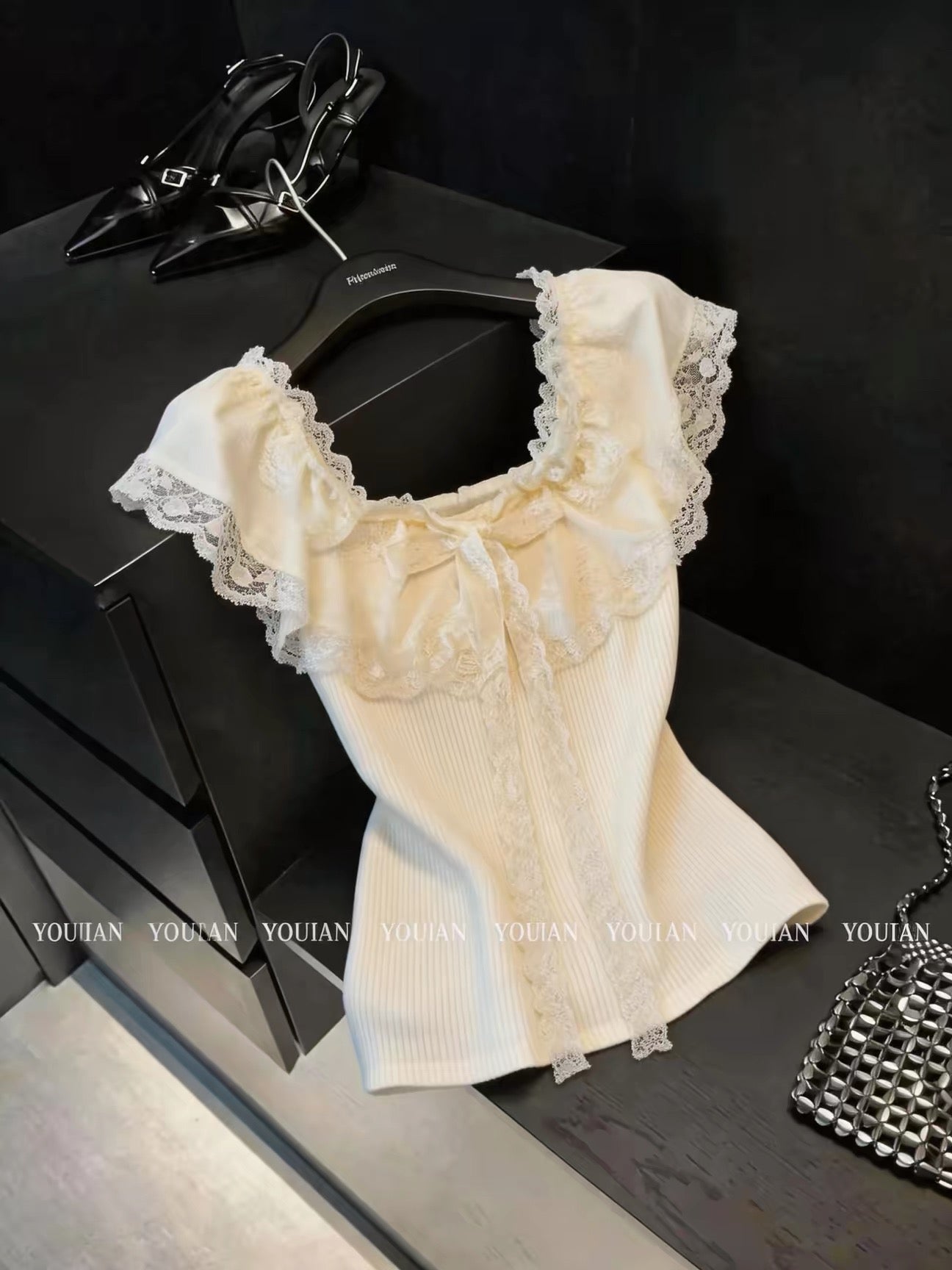 Shenzhen Nanyou High-End Women's Fashion 2026 New Arrival: Waist-Defining Knit Top with Lace Paneling and Flutter Sleeves