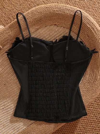 Black sexy 3D floral fishbone camisole top with bra padding, perfect for layering over a short, sexy, and alluring top.