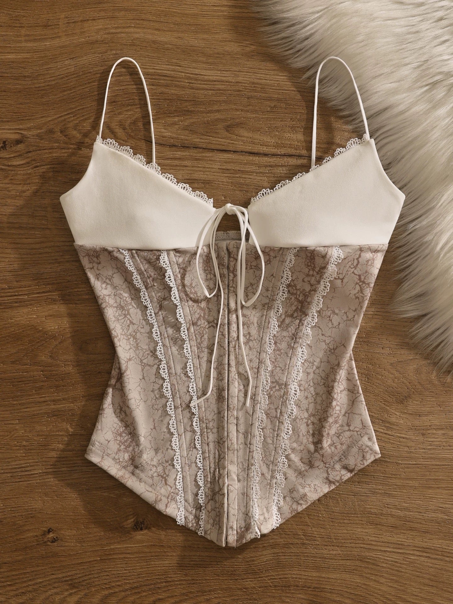 Sexy and alluring lace camisole for women, perfect for layering or wearing alone, sexy, slimming, and versatile.
