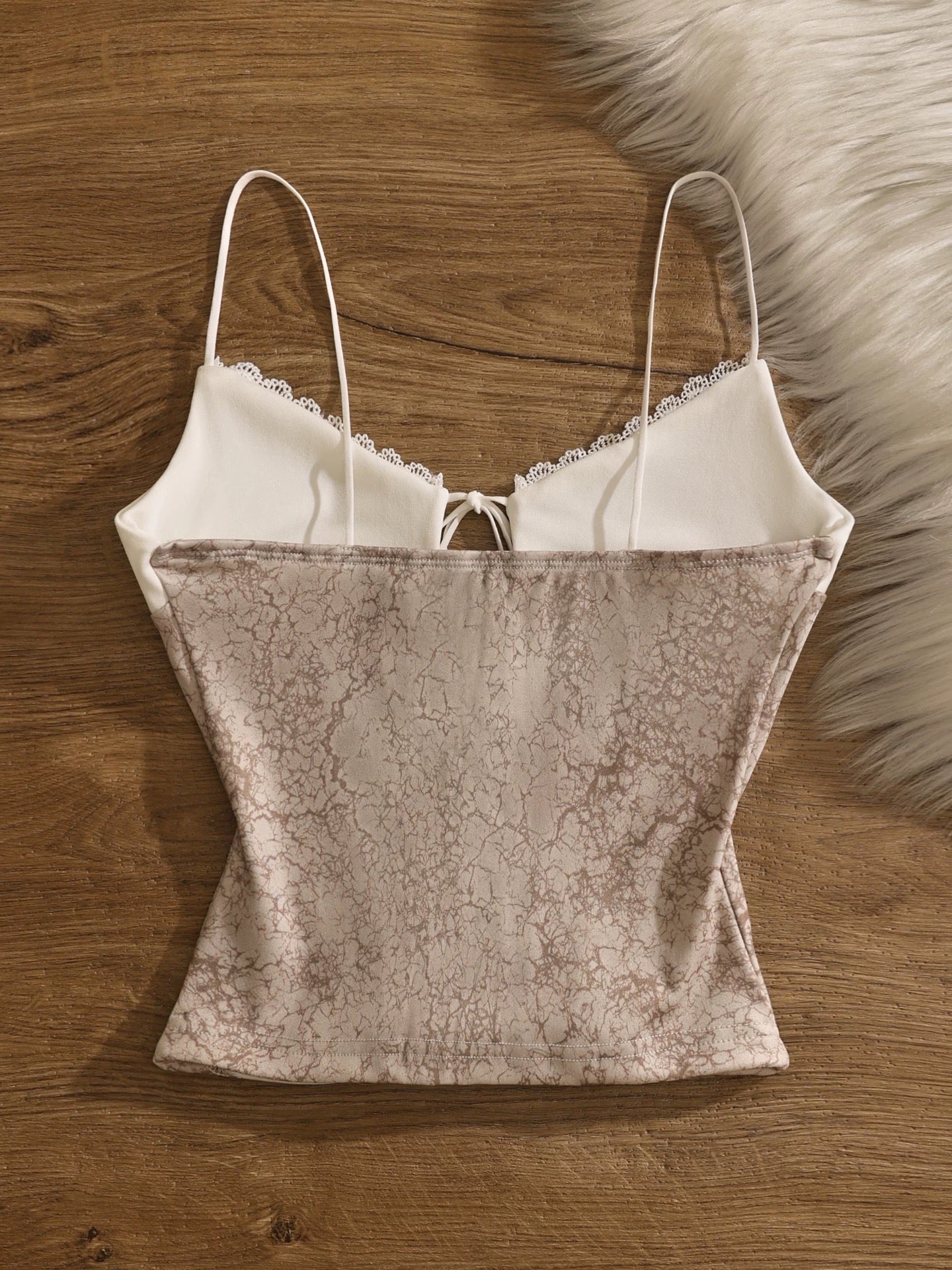 Sexy and alluring lace camisole for women, perfect for layering or wearing alone, sexy, slimming, and versatile.