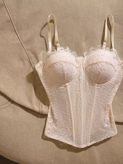 French-style lace bustier camisole with boning—a chic, sexy, and sweet top featuring a waist-cinching, slimming fit and built-in padding