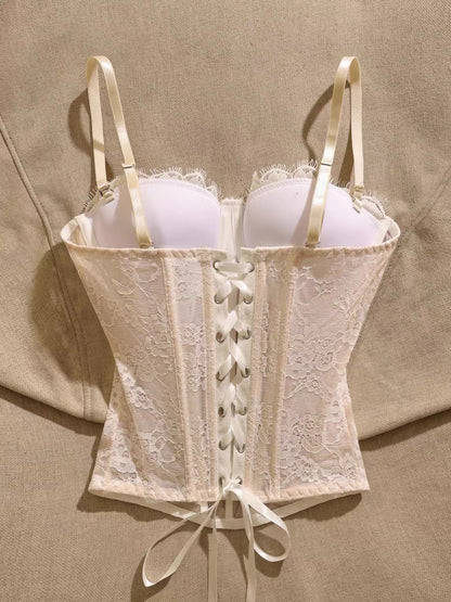 French-style lace bustier camisole with boning—a chic, sexy, and sweet top featuring a waist-cinching, slimming fit and built-in padding