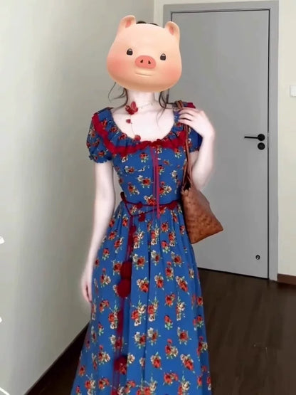 JIUYUEDI's French retro-style tea dress with a square neckline, blue floral print, and a slimming waistline, perfect for late September.