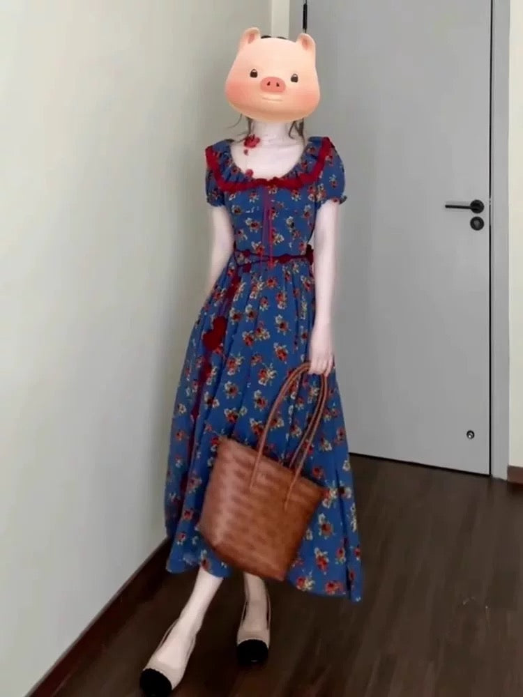JIUYUEDI's French retro-style tea dress with a square neckline, blue floral print, and a slimming waistline, perfect for late September.