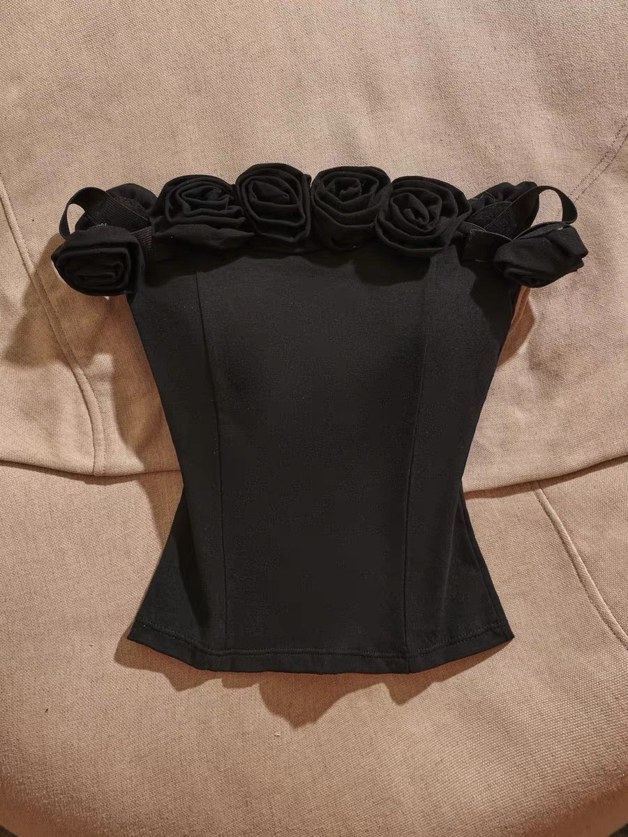 Sexy off-shoulder camisole with built-in padding—a stylish, slimming, and versatile top that balances innocent charm with a sultry vibe; perfect for wearing on its own.