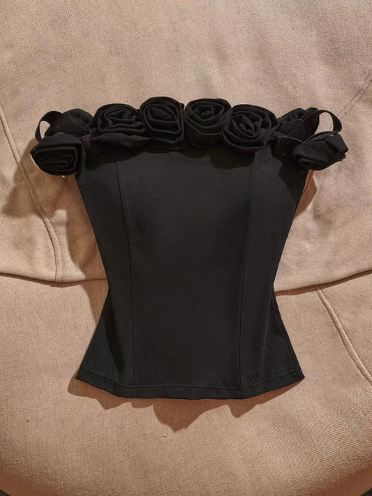 Sexy off-shoulder camisole with built-in padding—a stylish, slimming, and versatile top that balances innocent charm with a sultry vibe; perfect for wearing on its own.