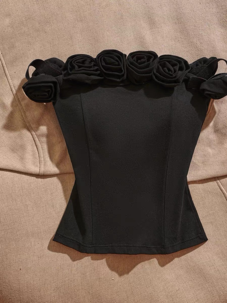 Sexy off-shoulder camisole with built-in padding—a stylish, slimming, and versatile top that balances innocent charm with a sultry vibe; perfect for wearing on its own.