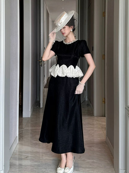 French retro splicing fake two-piece dress for women 2025 summer wear beaded round neck light luxury temperament long dress
