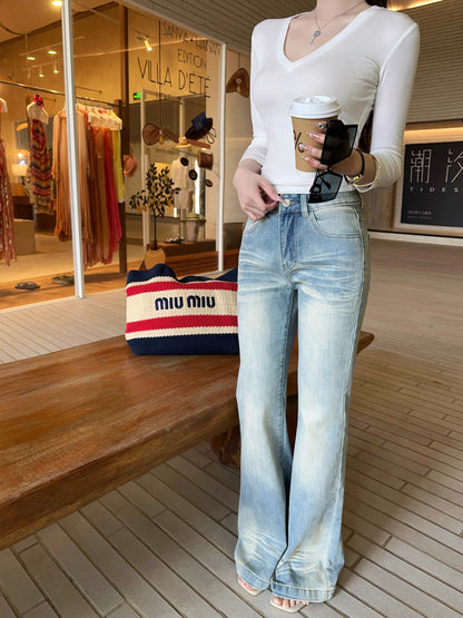 JAMAIS VU "Milk Tea Denim" – Spring-hued, custom-dyed casual trousers featuring a distressed, faded finish and a straight-leg, slight-flare cut.