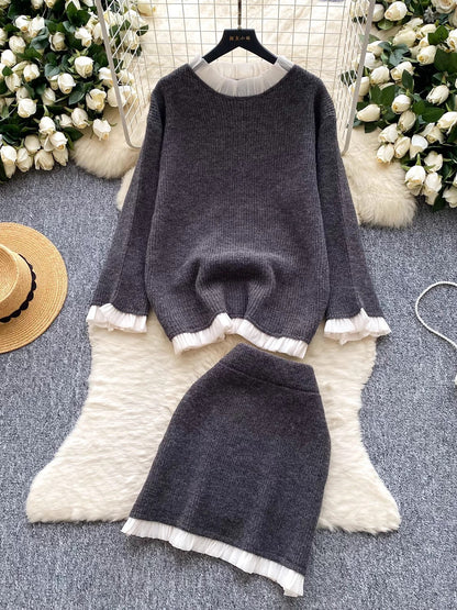 Gentle and elegant style for women's autumn and winter: long-sleeved loose knit top with ruffled trim and high-waisted bodycon skirt.