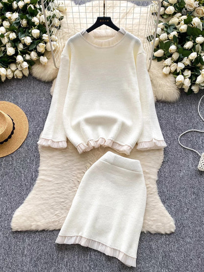 Gentle and elegant style for women's autumn and winter: long-sleeved loose knit top with ruffled trim and high-waisted bodycon skirt.