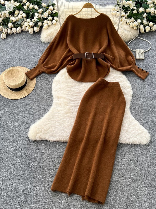 A sophisticated two-piece women's fashion set featuring a tie-waist, batwing sleeve knit top and a high-waisted pencil skirt.