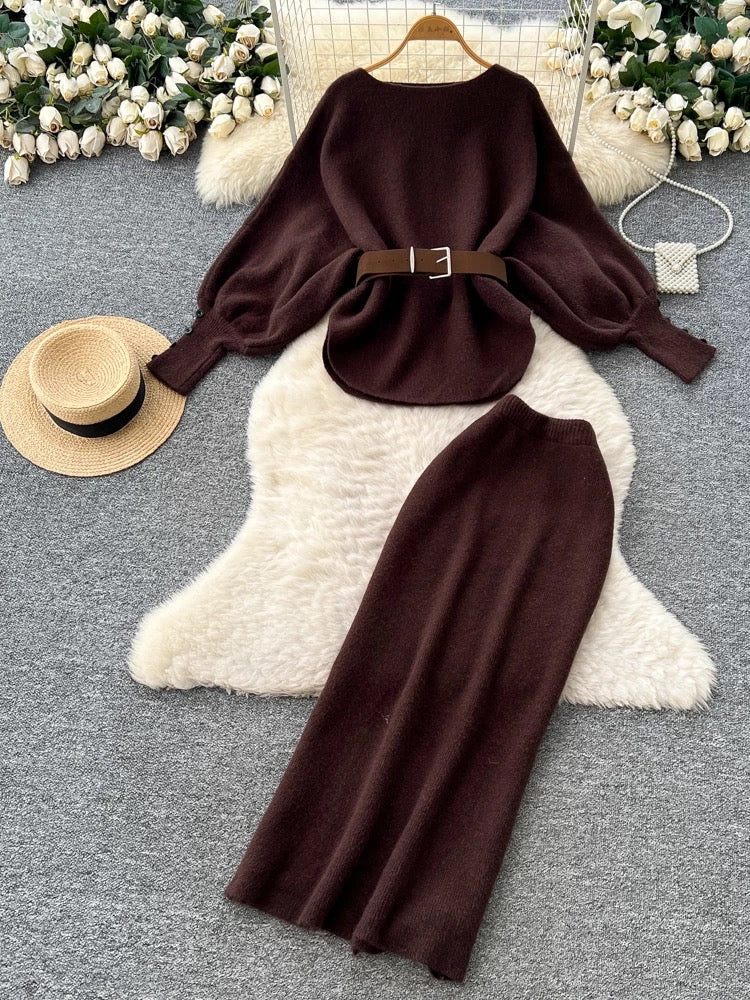 A sophisticated two-piece women's fashion set featuring a tie-waist, batwing sleeve knit top and a high-waisted pencil skirt.