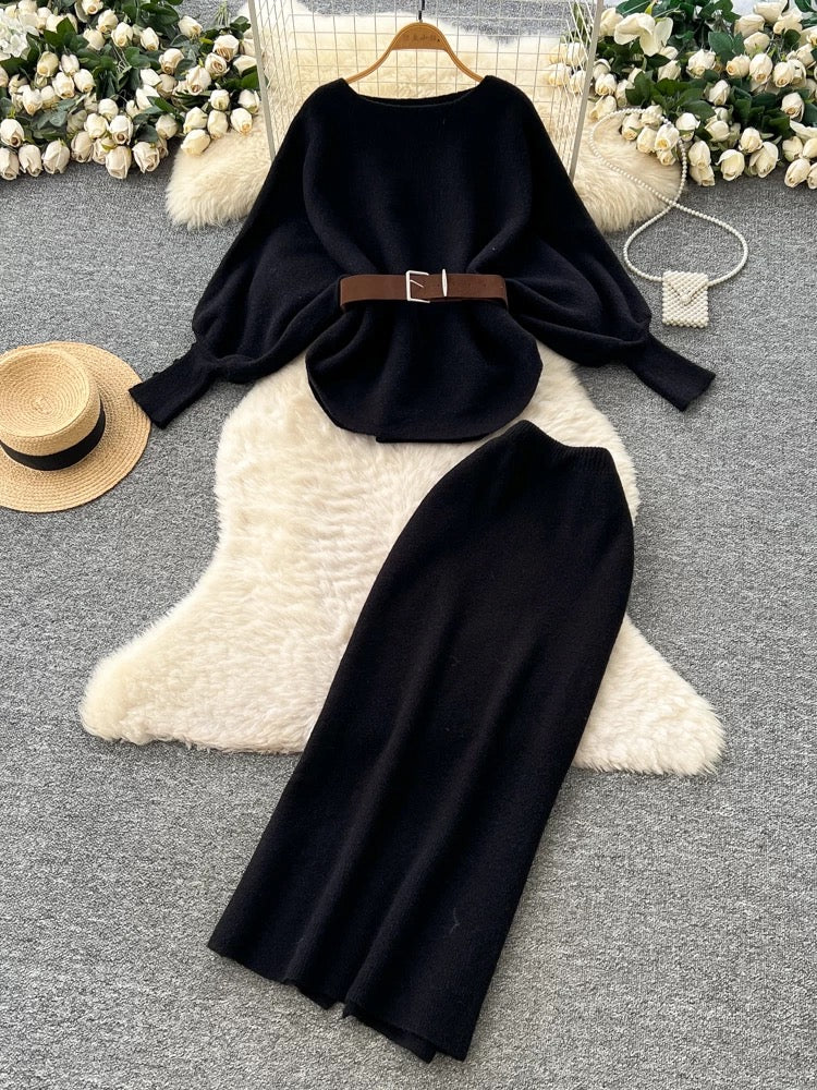 A sophisticated two-piece women's fashion set featuring a tie-waist, batwing sleeve knit top and a high-waisted pencil skirt.