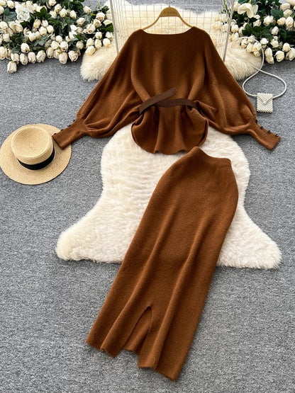 A sophisticated two-piece women's fashion set featuring a tie-waist, batwing sleeve knit top and a high-waisted pencil skirt.