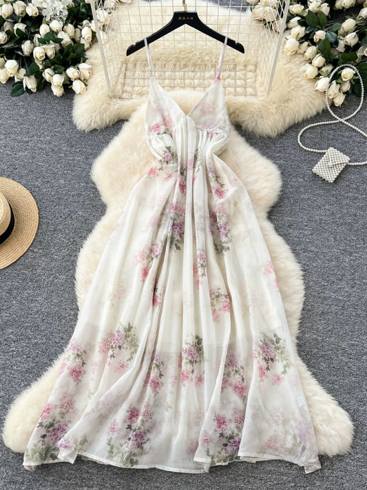 Minimalist French-style dress for women, spring style, high-waisted, slimming V-neck, floral chiffon, vacation-ready maxi dress.