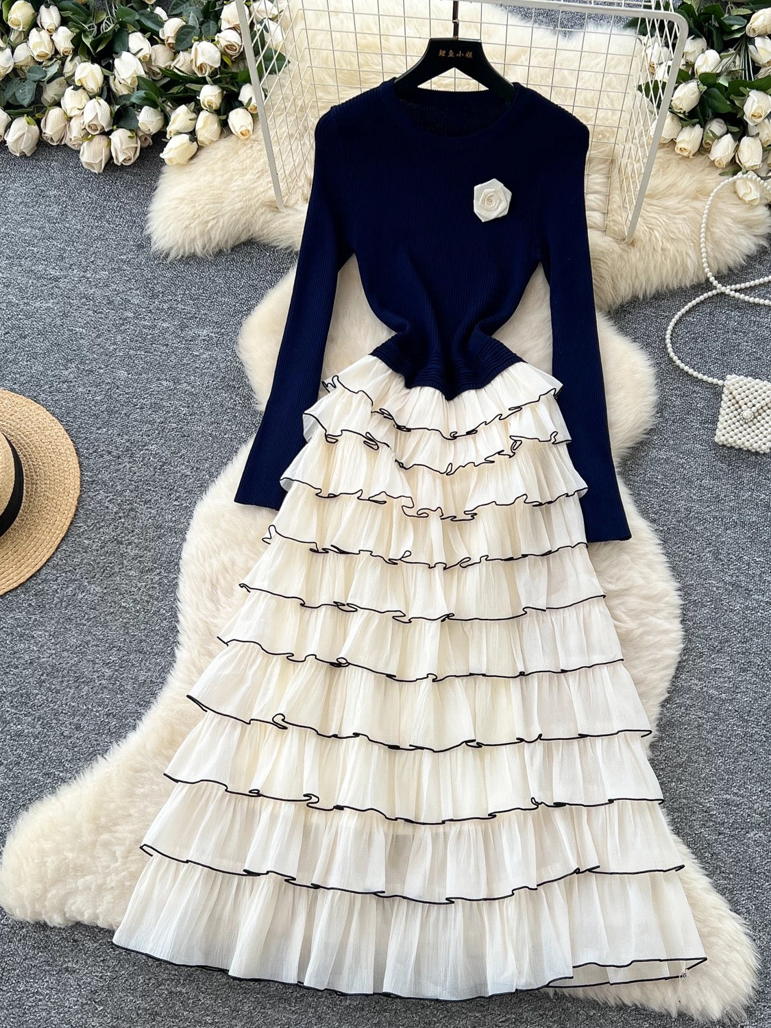 French-style, elegant floral round neck long-sleeved knit patchwork dress with a tiered cake design.