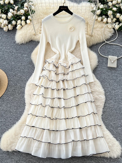 French-style, elegant floral round neck long-sleeved knit patchwork dress with a tiered cake design.