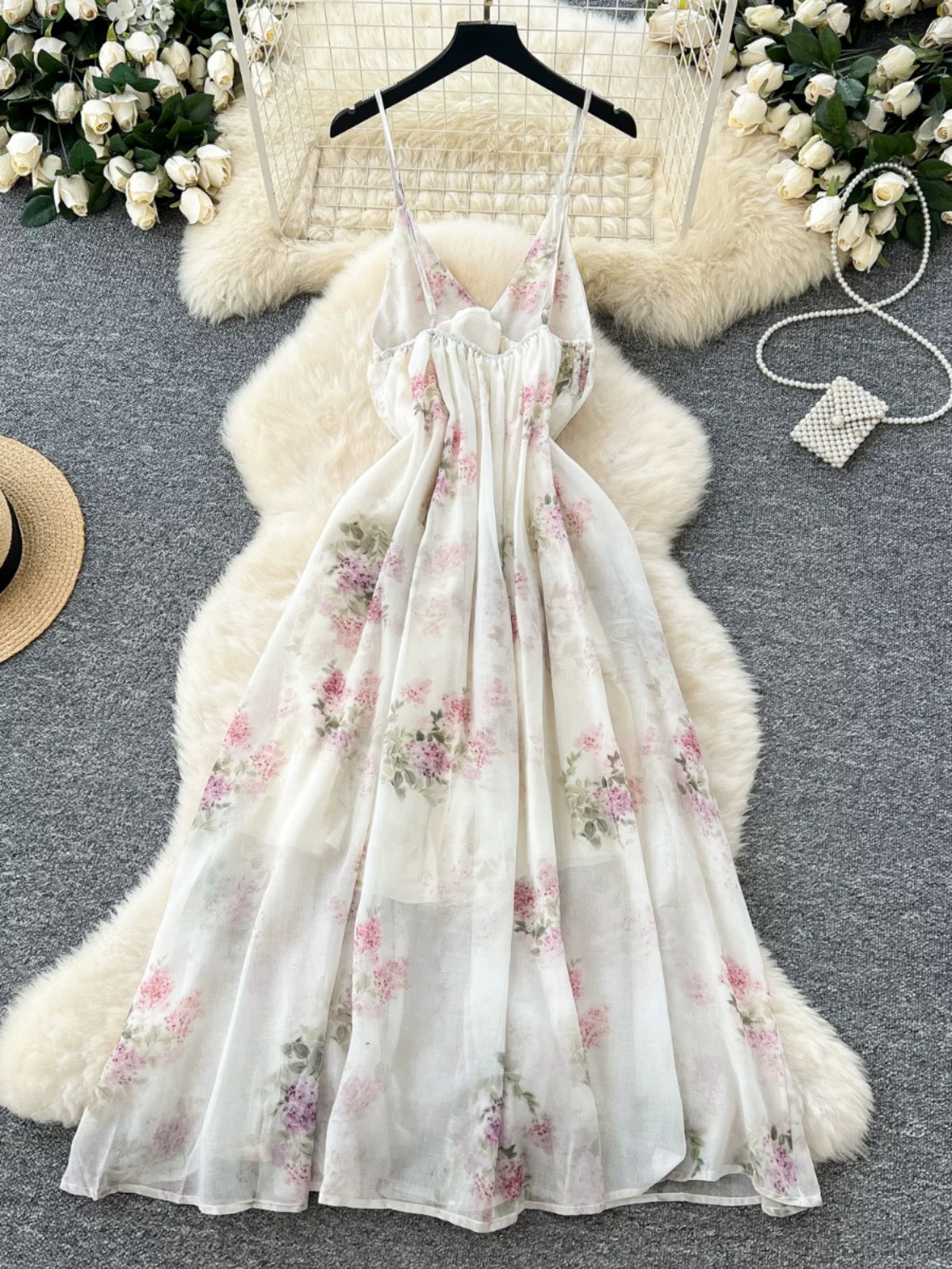 Minimalist French-style dress for women, spring style, high-waisted, slimming V-neck, floral chiffon, vacation-ready maxi dress.