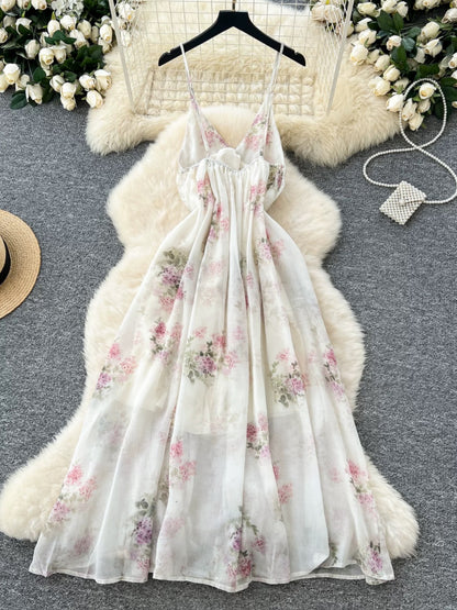 Minimalist French-style dress for women, spring style, high-waisted, slimming V-neck, floral chiffon, vacation-ready maxi dress.
