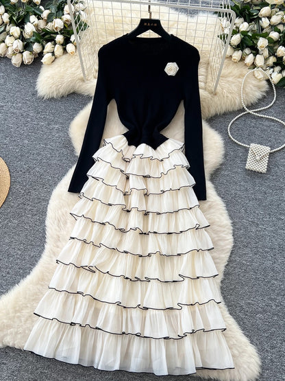 French-style, elegant floral round neck long-sleeved knit patchwork dress with a tiered cake design.