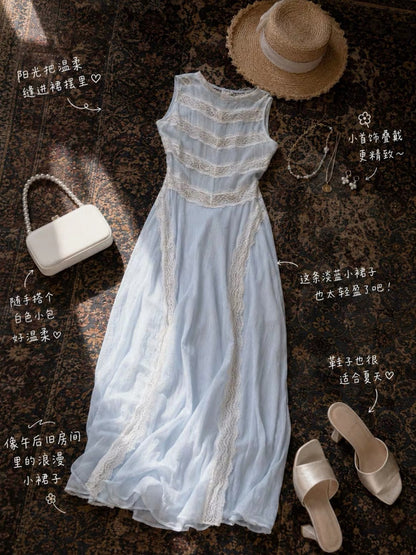 "Louvre Dreamscape" French vintage-style sleeveless maxi dress featuring a fitted waist and intricate, heavy-weight blended lace with cut-out detailing.