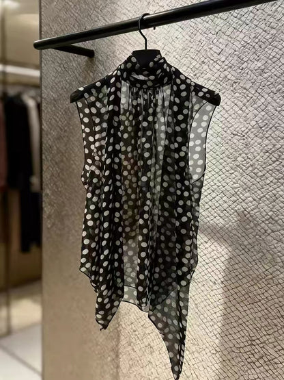 Korean-style sleeveless polka-dot top—a chic, sophisticated, and unique piece perfect for layering or wearing on its own this summer.