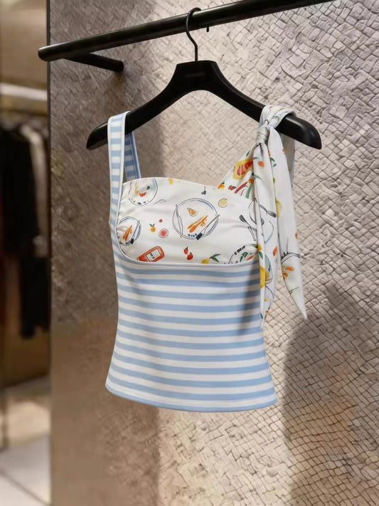 Chic, youthful-style camisole featuring a scarf-inspired print and stripes; a slim-fit, versatile summer top suitable for layering or wearing alone—perfect for a vacation look.