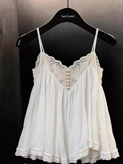 A stunning, stylish, and chic white camisole for women—perfect for summer workwear or casual outings. Featuring a flattering, slim-fit silhouette and exquisite lace paneling, this unique top blends fashion-forward design with effortless elegance.