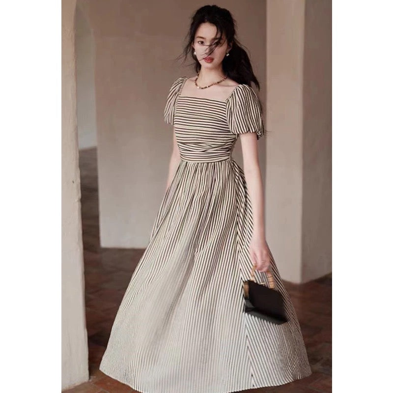 Meizi's same style [slightly drunken lines] black and white striped suspender dress design holiday style puff sleeve long skirt